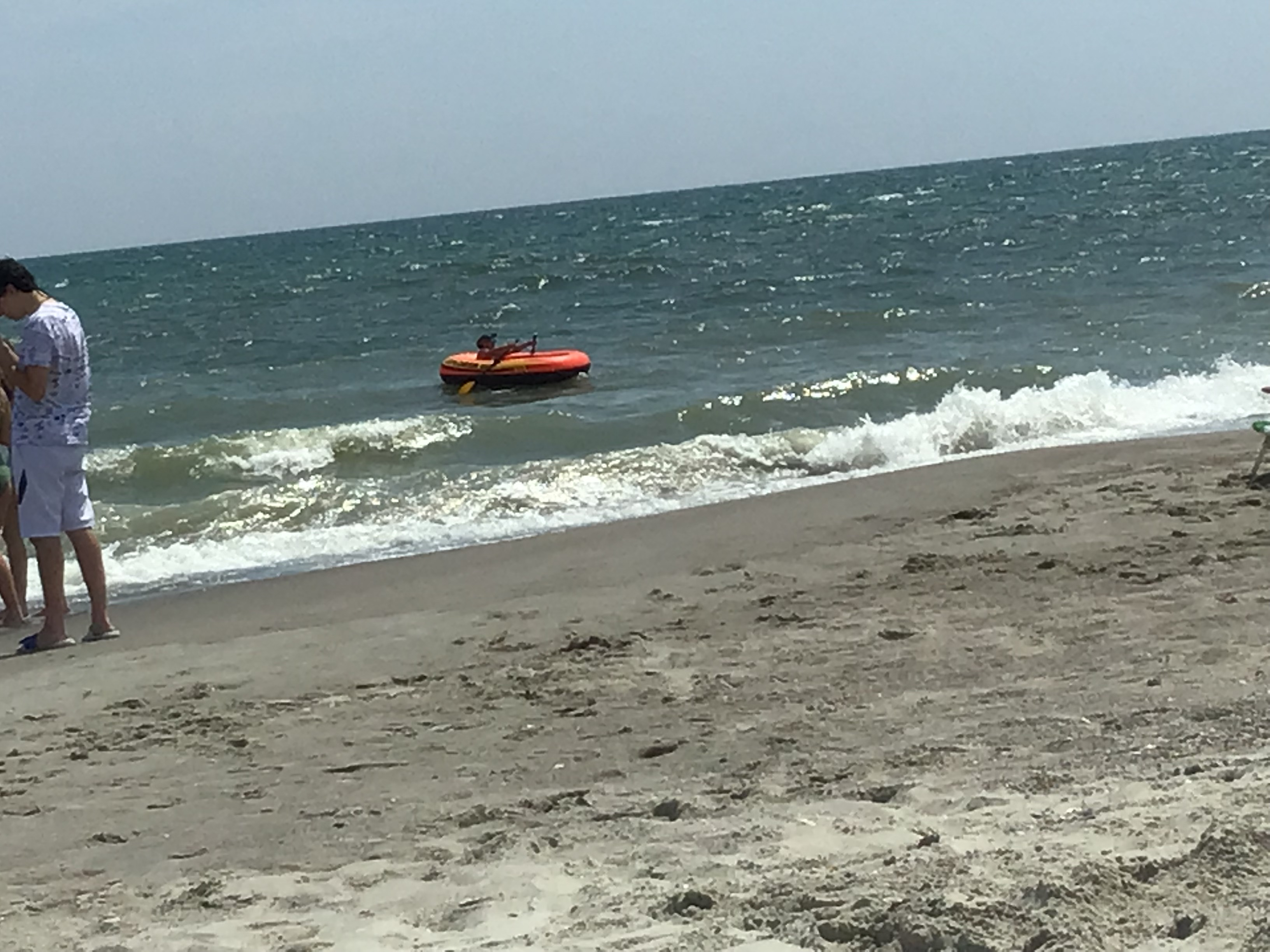 Jackson & Josh Curtis enjoy a boat and tubing at Oak Island NC        Location:  Sandpiper Cottage, Oak Island NC                                 Source:  Julane Crabtree                               Date: 25 Jul 2023