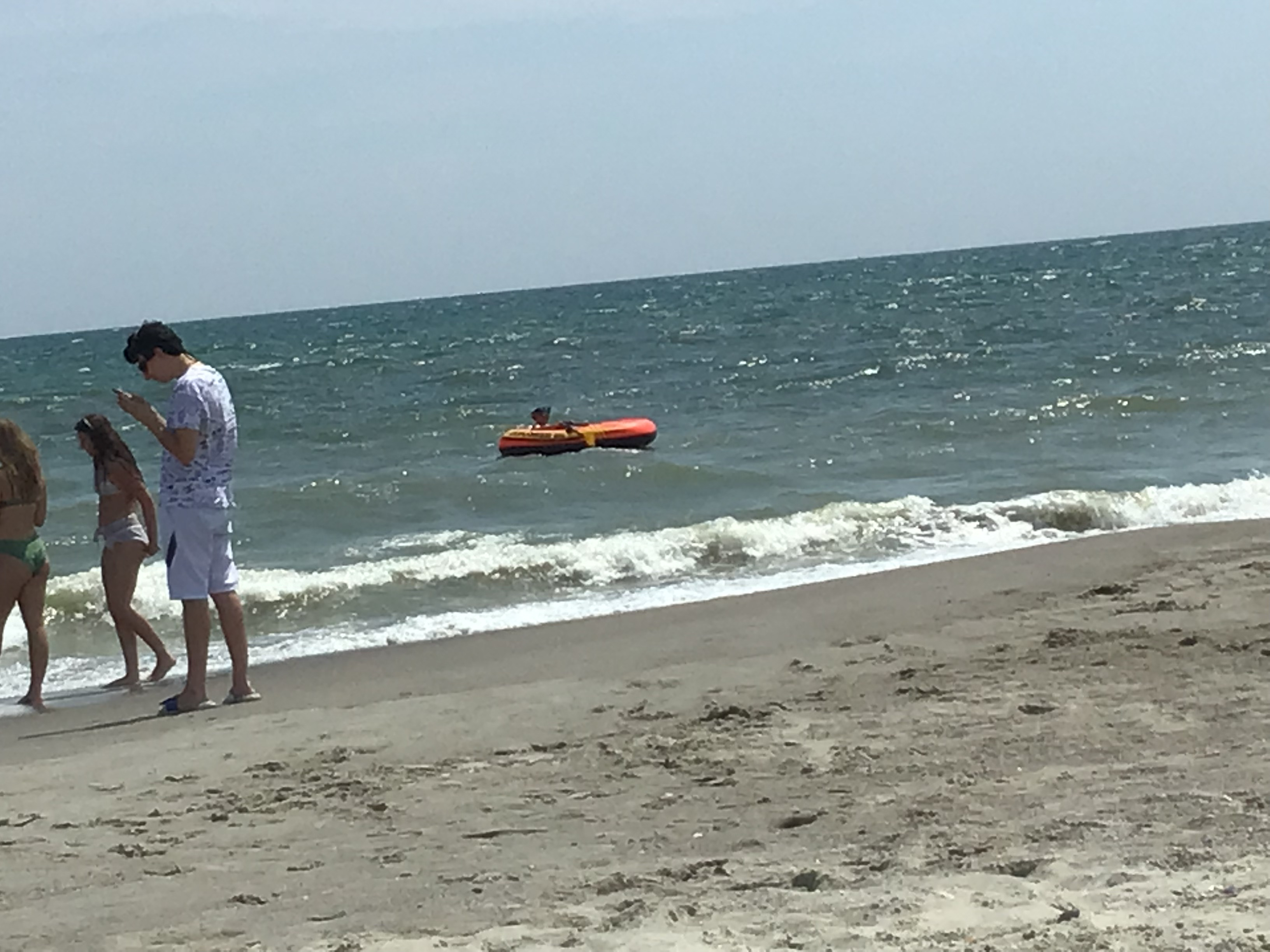 Jackson & Josh Curtis enjoy a boat and tubing at Oak Island NC        Location:  Sandpiper Cottage, Oak Island NC                                 Source:  Julane Crabtree                               Date: 25 Jul 2023