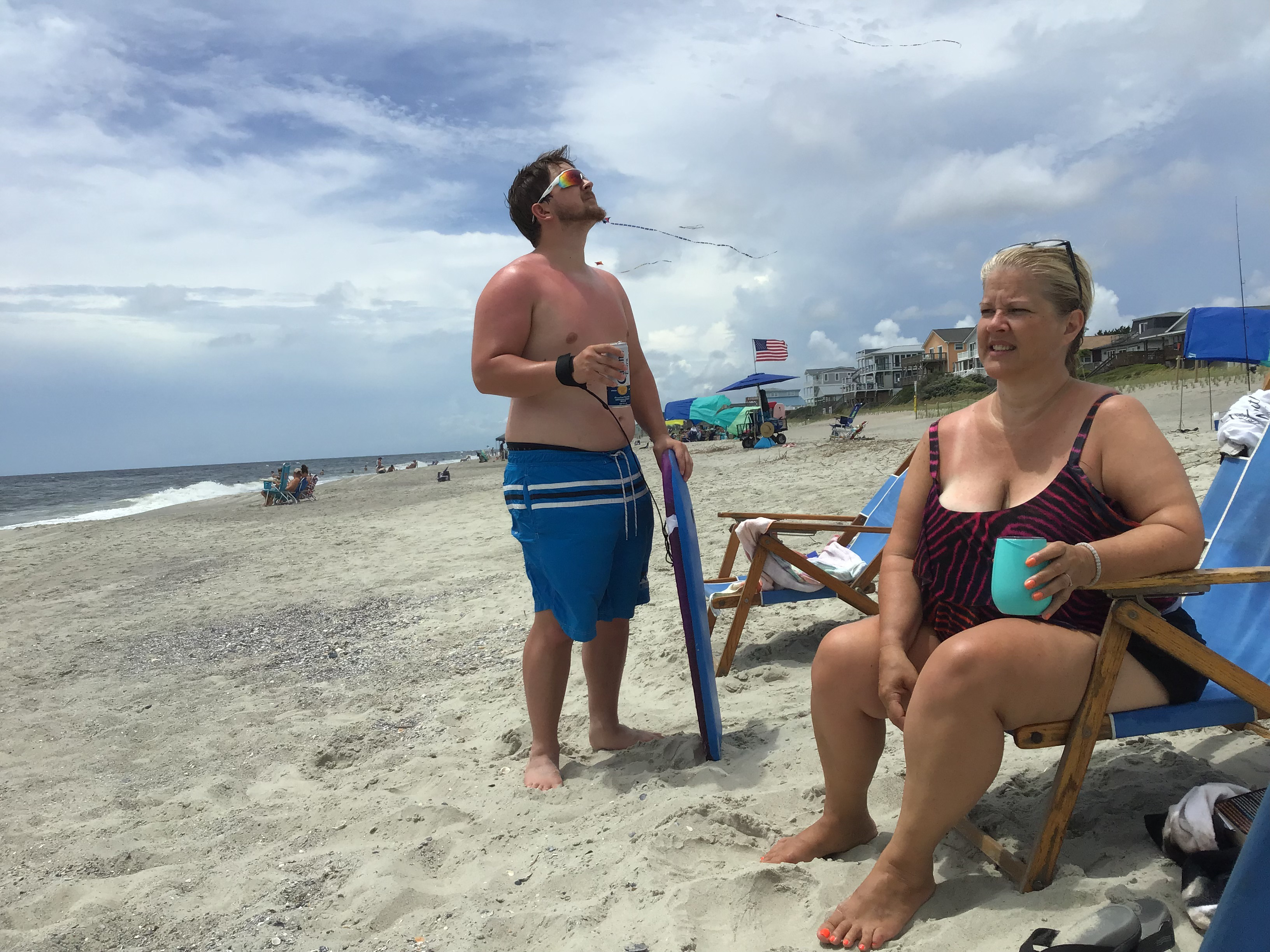 Josh & Odalie Curtis enjoy the beach.                                     Location:  Sandpiper Cottage, Oak Island, NC                                 Source: Julane Crabtree                                Date: 28 Jul 2023