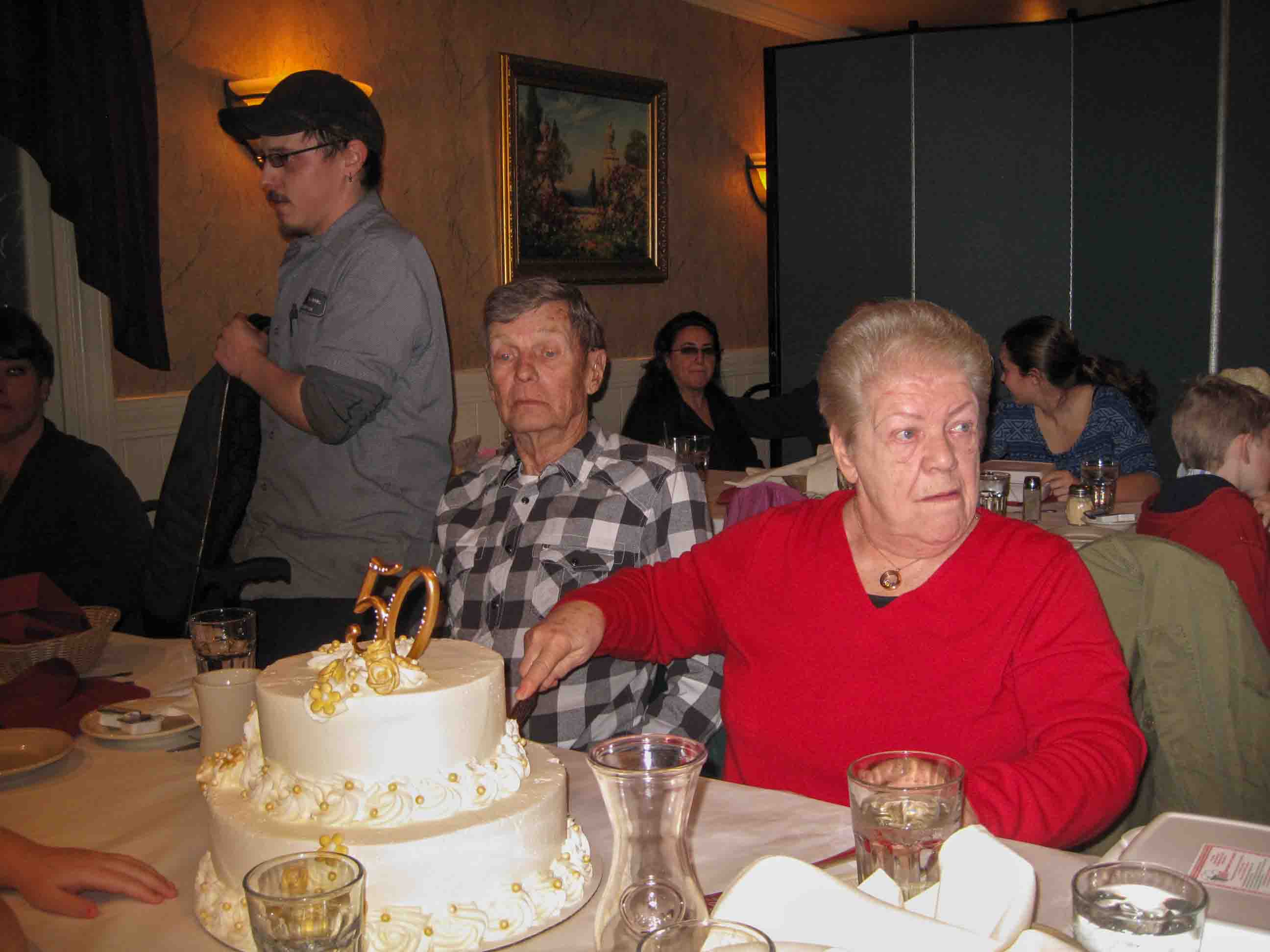 Celebrating the 50th Wedding Anniversary of Shirley & Joel Sexton.  Mark Sexton, Joel, DeeDee Sexton, Shirley 
Location:  TAT Restaurant, Columbus OH
Date:  29 Mar 2014
Source:  Julane Crabtree